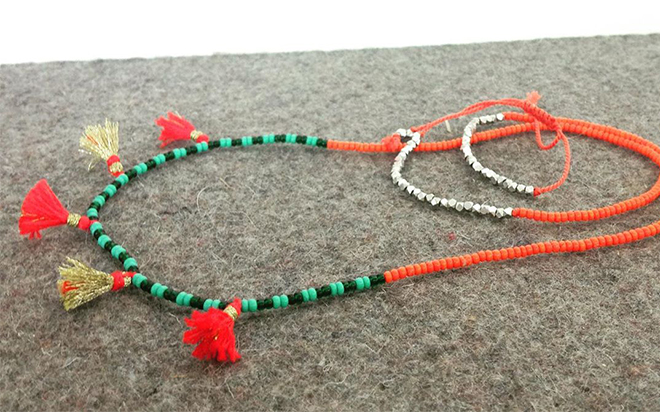 Rhapsobead Orange Schwarz Gruen Silber Roten Und Goldenen Quasten Kette